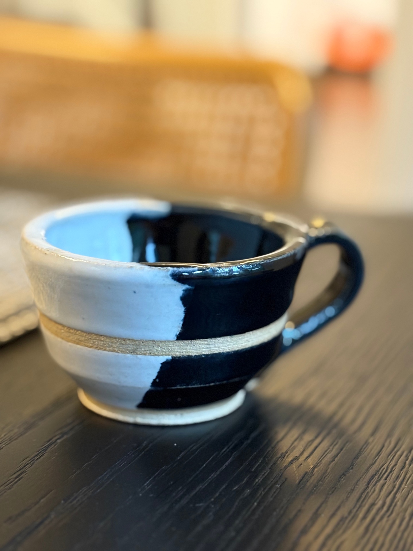 Blue and black pottery mug